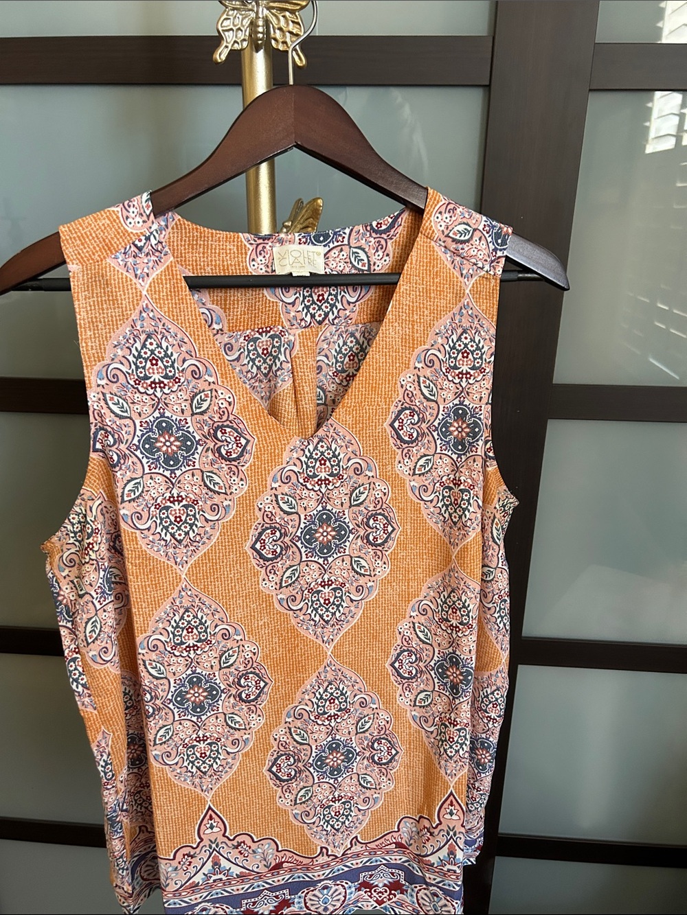 Violette Claire Orange Printed V-Neck Sleeveless Top